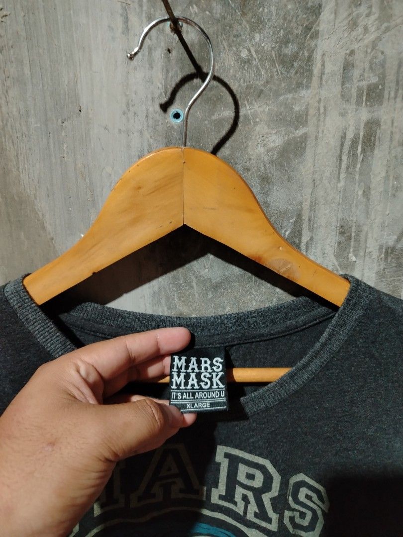 MARS MASK Graphic T-Shirt XL (Category: Tshirts & Polo Shirts ) located in Tagum. Submitted by kotasallys40096 (Listing ID 1463696108, Image 3). Description: - Grey MARS MASK graphic tee - 23*28 - Features a cool zombie-like face print - Size: XL - Material: 100% Cotton - Made in China - Ideal for casual wear.