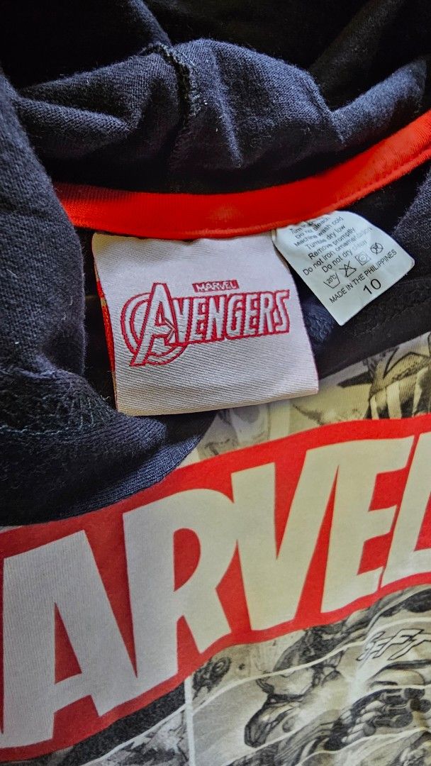 Marvel Avengers Comic Print T-Shirt Size 10 (Category: Tshirts & Polo Shirts ) located in Quezon City. Submitted by dawnest (Listing ID 1463627443, Image 2). Description: - Cool Marvel Avengers T-shirt - Features a comic print design and large Marvel logo on the front - Plain black back - Size 10 -16 inches width, 20 inches length - Ideal for any Marvel fan! .