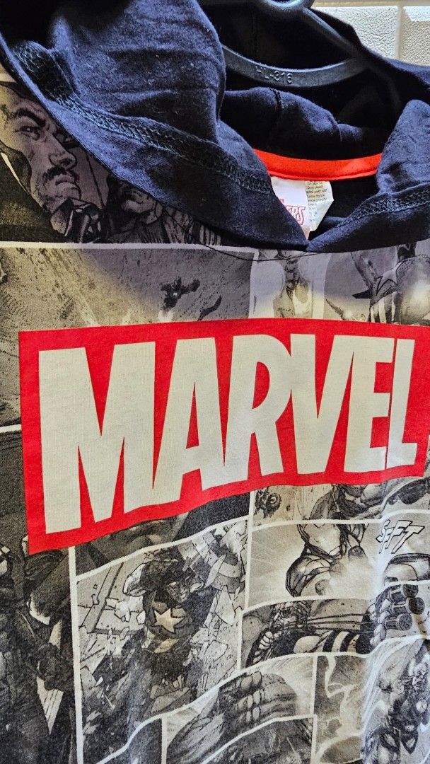 Marvel Avengers Comic Print T-Shirt Size 10 (Category: Tshirts & Polo Shirts ) located in Quezon City. Submitted by dawnest (Listing ID 1463627443, Image 3). Description: - Cool Marvel Avengers T-shirt - Features a comic print design and large Marvel logo on the front - Plain black back - Size 10 -16 inches width, 20 inches length - Ideal for any Marvel fan! .