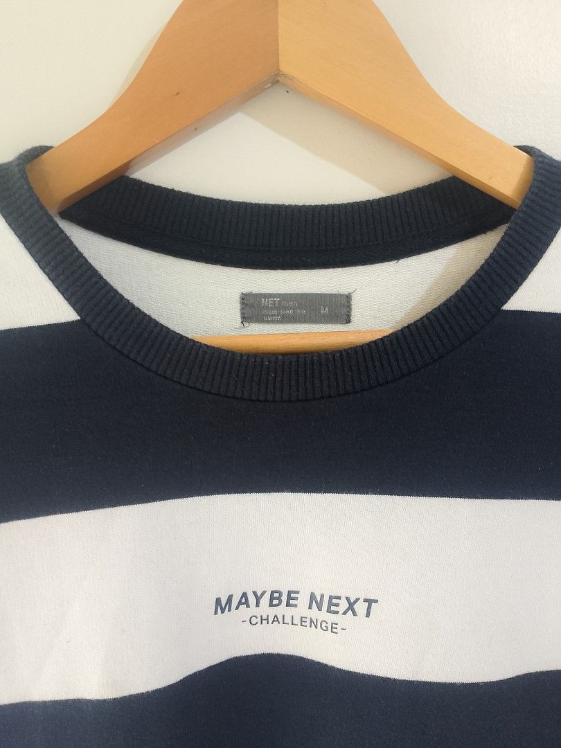 Maybe Next Striped T-shirt (Category: Tshirts & Polo Shirts ) located in La Trinidad. Submitted by honeysplushies2 (Listing ID 1463641560, Image 2). Description: - Classic navy and white striped t-shirt - Brand: Maybe Next - Size: M-L - Material: Comfortable cotton - Fit: Relaxed - Style: Casual, everyday wear - Versatile: Pairs well with jeans or shorts.