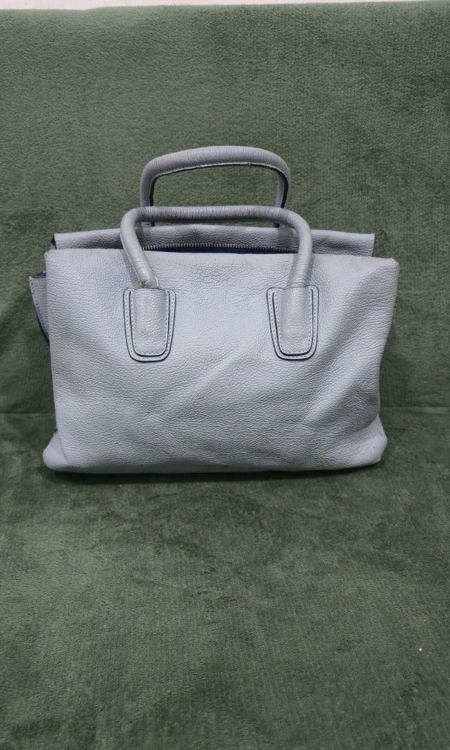 MCM Milla Sky Blue Bag (Category: Luxury Bags & Wallets) located in Bacoor. Submitted by deux_trading_corporation (Listing ID 1463727987, Image 2). Description: 15k and above on 2ndhand market. condition: Rank AB - has normal signs of wear but no damage whatsoever. needs bags spa. payment first. you can always ask for discount/tawad but no to sobrang barat. no reservation. always check all the photos. some photo/s indicate the flaw..