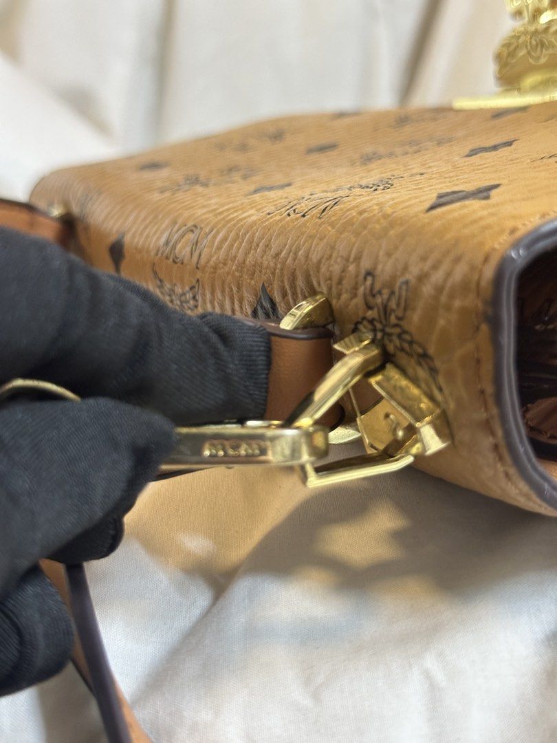 MCM Visetos Monogram Shoulder Bag (Category: Luxury Bags & Wallets) located in Quezon City. Submitted by mnmcollections (Listing ID 1463649504, Image 3). Description: -Preloved Coded, Good Condition - Classic MCM shoulder bag - Signature Visetos monogram in tan and brown - Gold-tone hardware - Secure clasp closure - Interior zip pocket - Detachable shoulder strap included - Ideal for everyday use.