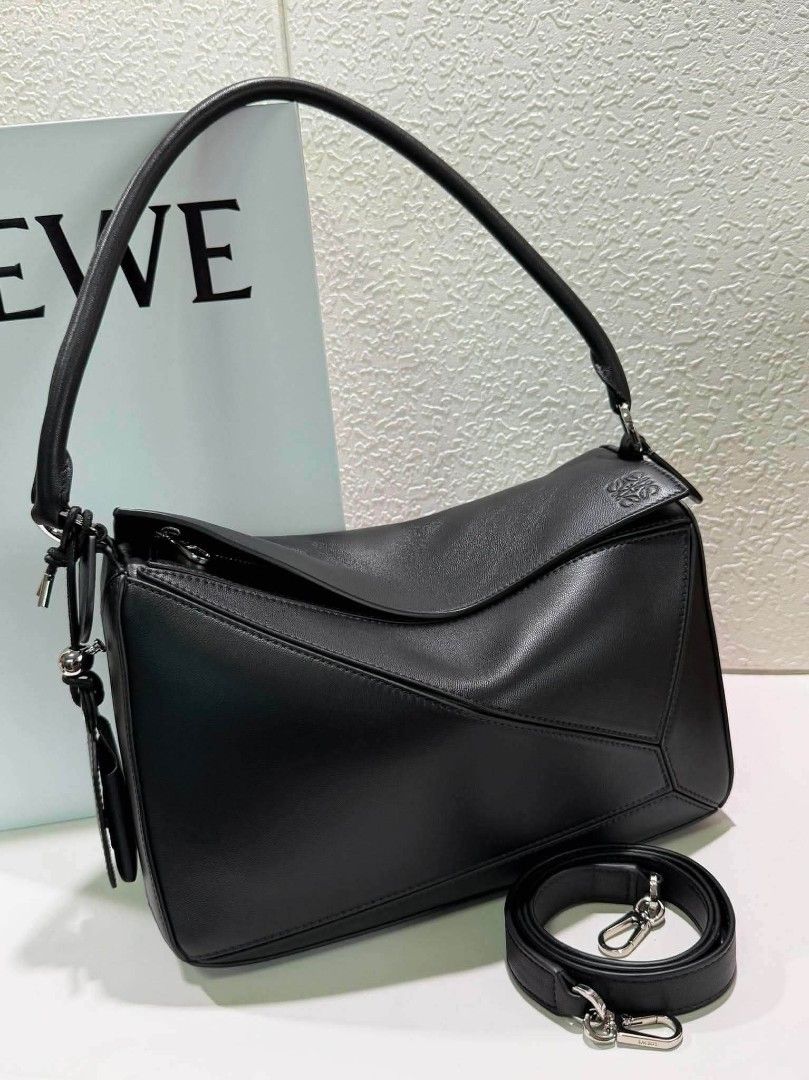 Medium Featherlight Puzzle Bag - Black (Category: Cross-body Bags) located in Marilao. Submitted by shopforyouph (Listing ID 1463394751, Image 1). Description: size 30cm complete inclusion with dustbag cards and box detailed photos posted 🔝premium.
