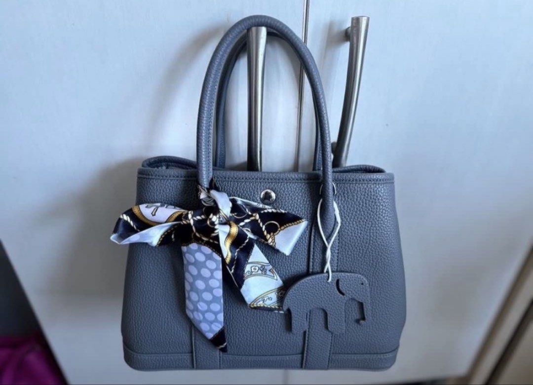 Medium Grey Elephant Handbag with FREE bag organizer insert (Category: Tote Bags) located in Caloocan City. Submitted by tsukki0440 (Listing ID 1463613064, Image 1). Description: 🌸 Condition: - Pre-loved - Overall in great condition - Functional and presentable * RFS: Decluttering + need funds! * Perfect for everyday use, work, or casual outings. * You can message me for more photos, videos, or inquiries. * SF will be shouldered by the buyer! .