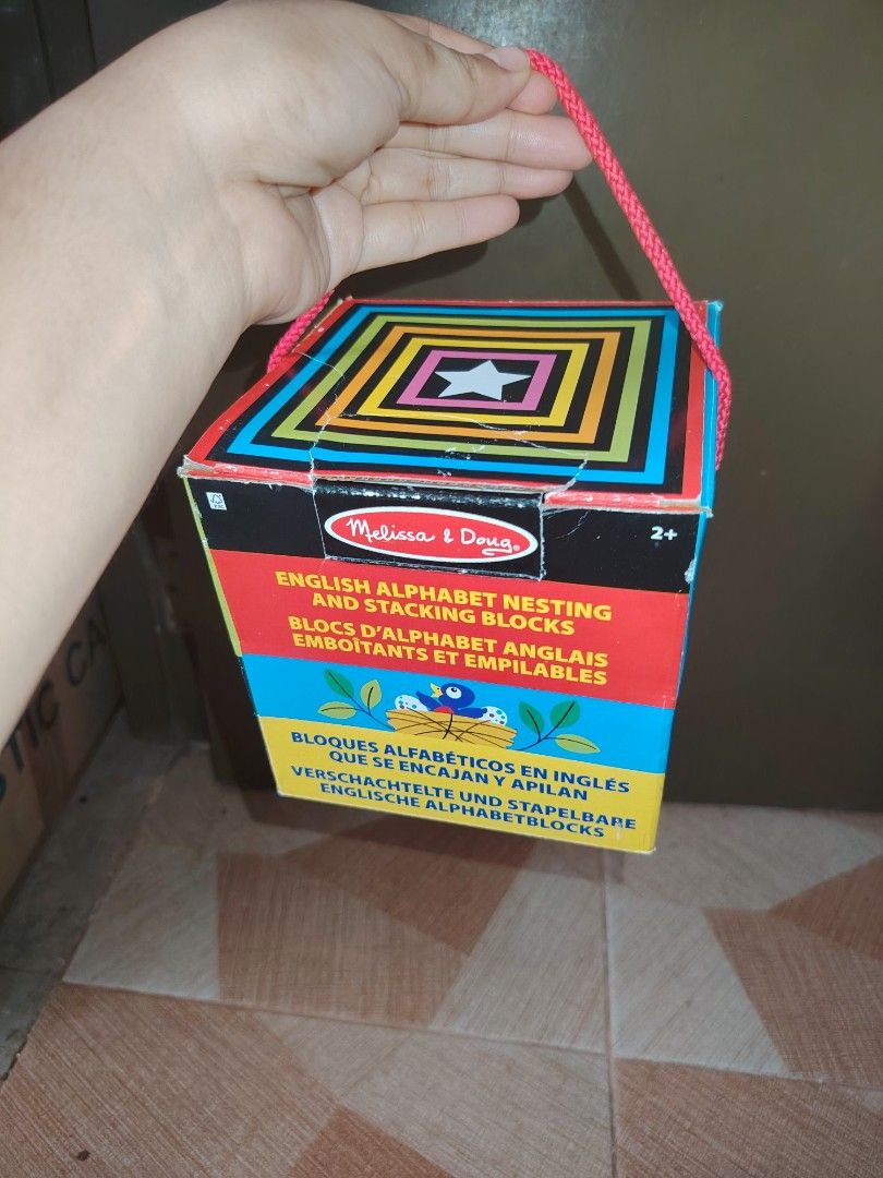 Melissa & Doug English Alphabet Nesting and Stacking Blocks (Category: Educational & Learning Toys) located in Santiago. Submitted by aceheart0118672 (Listing ID 1463618604, Image 3). Description: missing letter 'z - Learn the alphabet with colorful wooden blocks from Melissa & Doug. - Each block features a letter and a fun illustration. - Perfect for stacking and nesting for easy storage. - Suitable for toddlers and preschoolers aged 2 and up..
