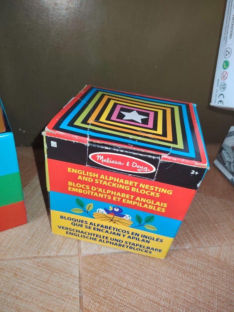 Melissa & Doug English Alphabet Nesting and Stacking Blocks (Category: Educational & Learning Toys) located in Santiago. Submitted by aceheart0118672 (Listing ID 1463618604, Image 2). Description: missing letter 'z - Learn the alphabet with colorful wooden blocks from Melissa & Doug. - Each block features a letter and a fun illustration. - Perfect for stacking and nesting for easy storage. - Suitable for toddlers and preschoolers aged 2 and up..