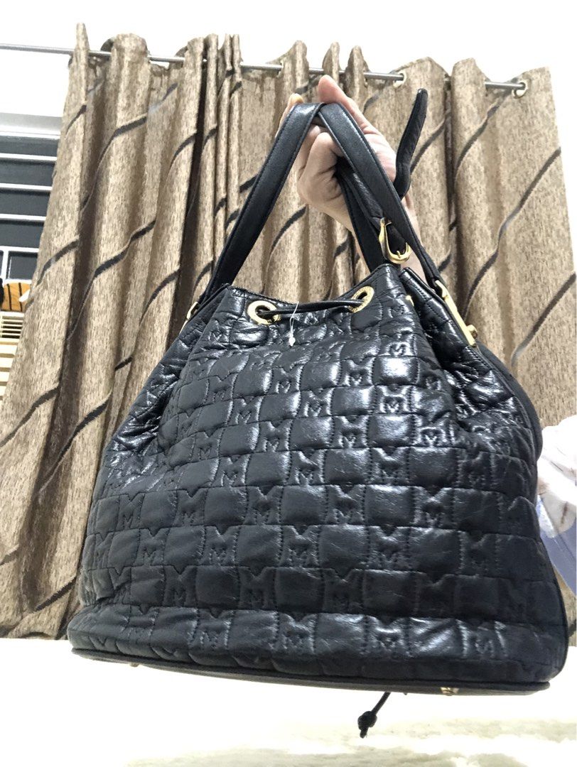 Metrocity - Quilted Leather Bucket Bag (Category: Luxury Bags & Wallets) located in Rizal. Submitted by elviedc2420209 (Listing ID 1463686796, Image 2). Description: - Genuine black leather bucket bag - Elegant quilted pattern - Secure drawstring closure - Polished gold hardware - Interior zip pocket for essentials - Adjustable straps for comfortable carrying - Ideal for everyday use.