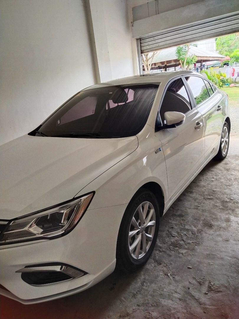 MG 5 (Category: Used Cars) located in Caloocan City. Submitted by alem19 (Listing ID 1463597863, Image 1). Description: m5 cvt core 1.5 automatic color white all leather with sunroof key less entry push start Touchscreen display audio system with Bluetooth and USB connectivity. Cruise control, rear parking camera, Anti-lock Braking System (ABS) with Electronic Brakeforce Distribution (EBD), and dual front airbags Halogen projector headlights with