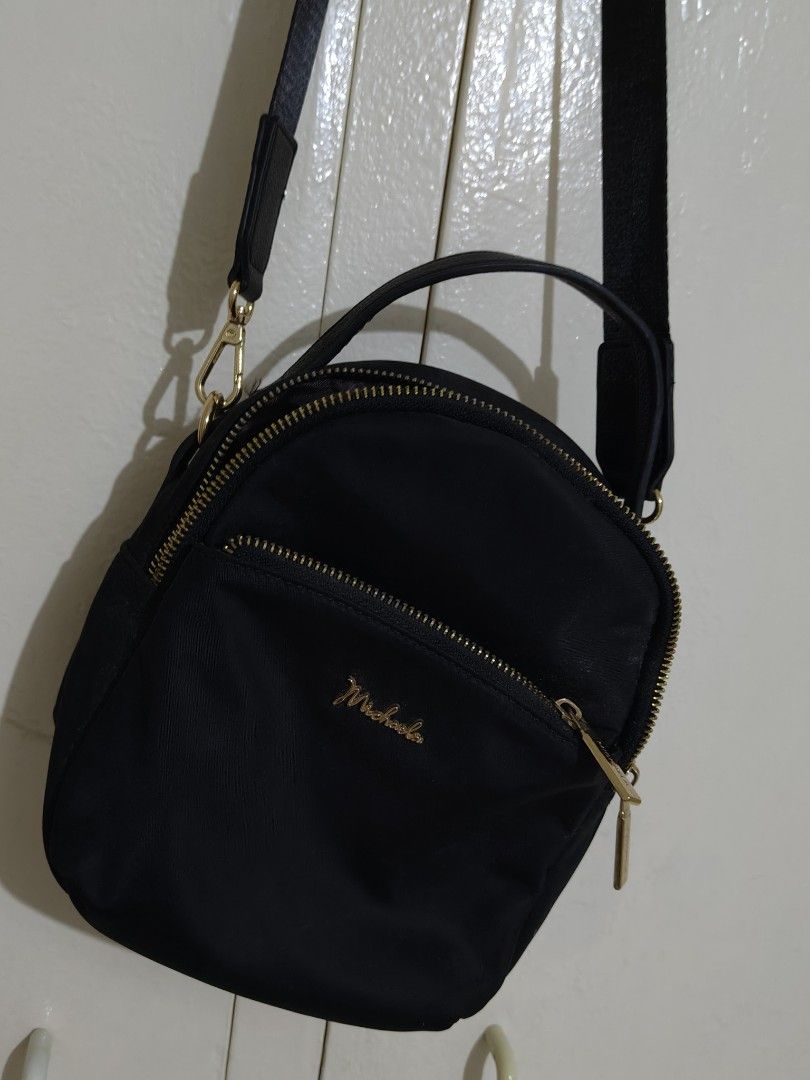 MICHAELA SLING BAGS (Category: Cross-body Bags) located in Cainta. Submitted by relove.finds_2020 (Listing ID 1463718503, Image 3). Description: - MICHAELA SLING BAG - BLACK AND GOLD ZIPPERS - HAS A LOT OF COMPARTMENTS - GOOD AS NEW.
