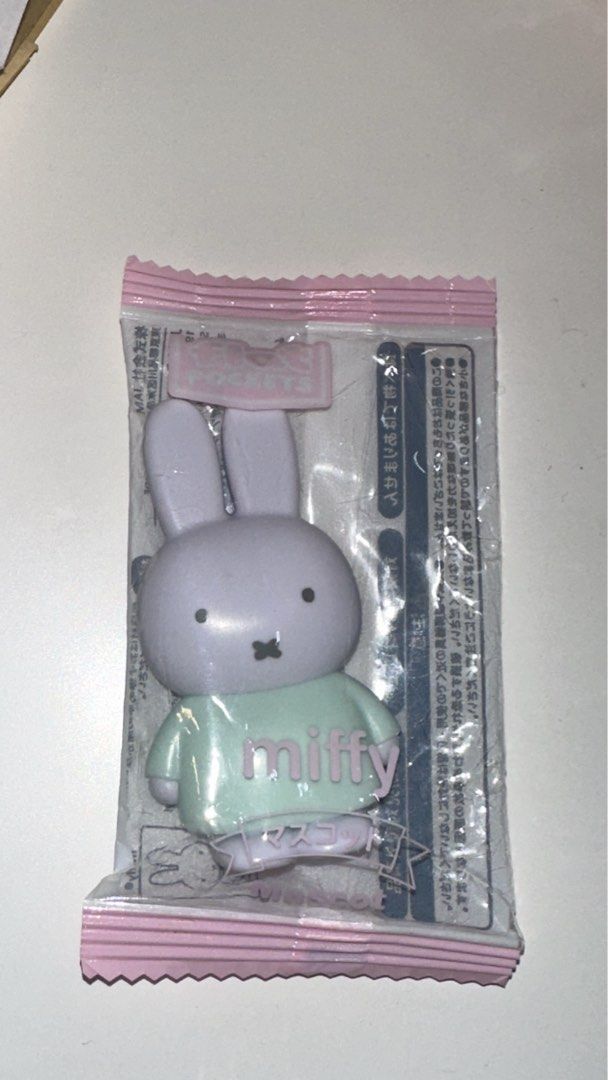 Miffy figure (Category: Designer & Blind Box Toys) located in Malabon City. Submitted by alysaleee (Listing ID 1463697212, Image 1). Description: - Brand new Miffy mascot toy - Still in original packaging - Purple Miffy with a light green shirt - Shirt features 'miffy' text and Japanese writing - Ideal gift for Miffy enthusiasts and collectors.