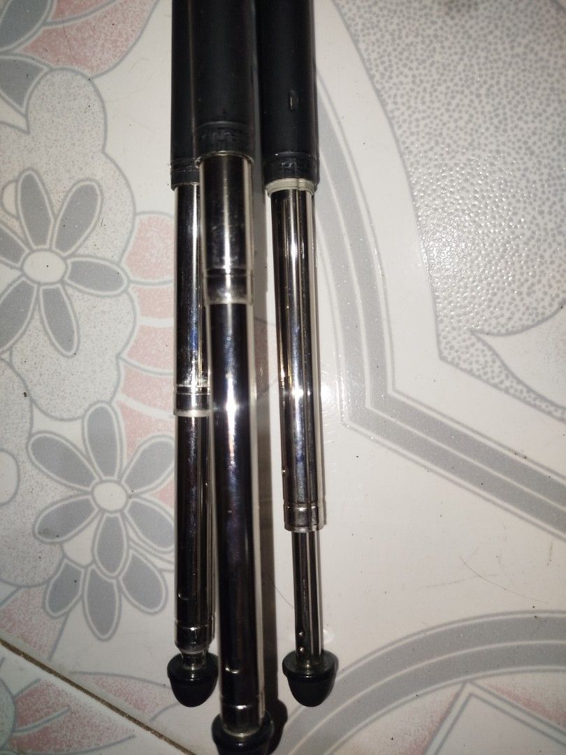 Mini Tripod for Camera and Phone (Category: Tripods & Monopods) located in Manila. Submitted by jojo.welter (Listing ID 1463578882, Image 3). Description: - Compact and travel-friendly tripod - Extends to hold your camera or phone steady - Black and silver finish - Folds down small for easy storage - Provides stable shots on any surface.