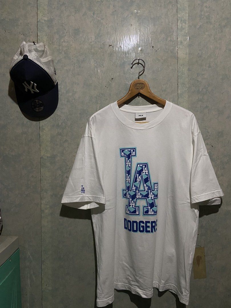 MLB LA Dodgers Tee (Category: Tshirts & Polo Shirts ) located in Tagum. Submitted by manifesto.arch (Listing ID 1463601238, Image 1). Description: LA Dodgers Dimes: 21x29 Good Large Pristine Condition (Wash it again for safety) Can vouch on any platform .