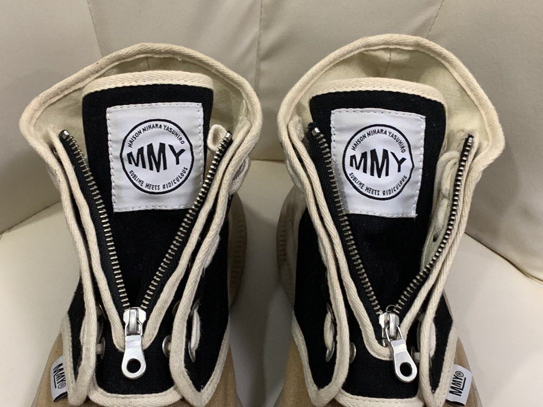 MMY ORIGINAL SOLE MILITARY SNEAKER BOOTS (Category: Sneakers) located in Cavite. Submitted by ___layern0ne (Listing ID 1463666299, Image 2). Description: • Marked Size: 42 • No inclusions | Pair only • The pair is still in good, well used vintage condition • The tan canvas panels around the toe box and the off-white rubber toe caps show minor superficial surface scuffing and light discoloration, which aligns naturally with light wear on these spe