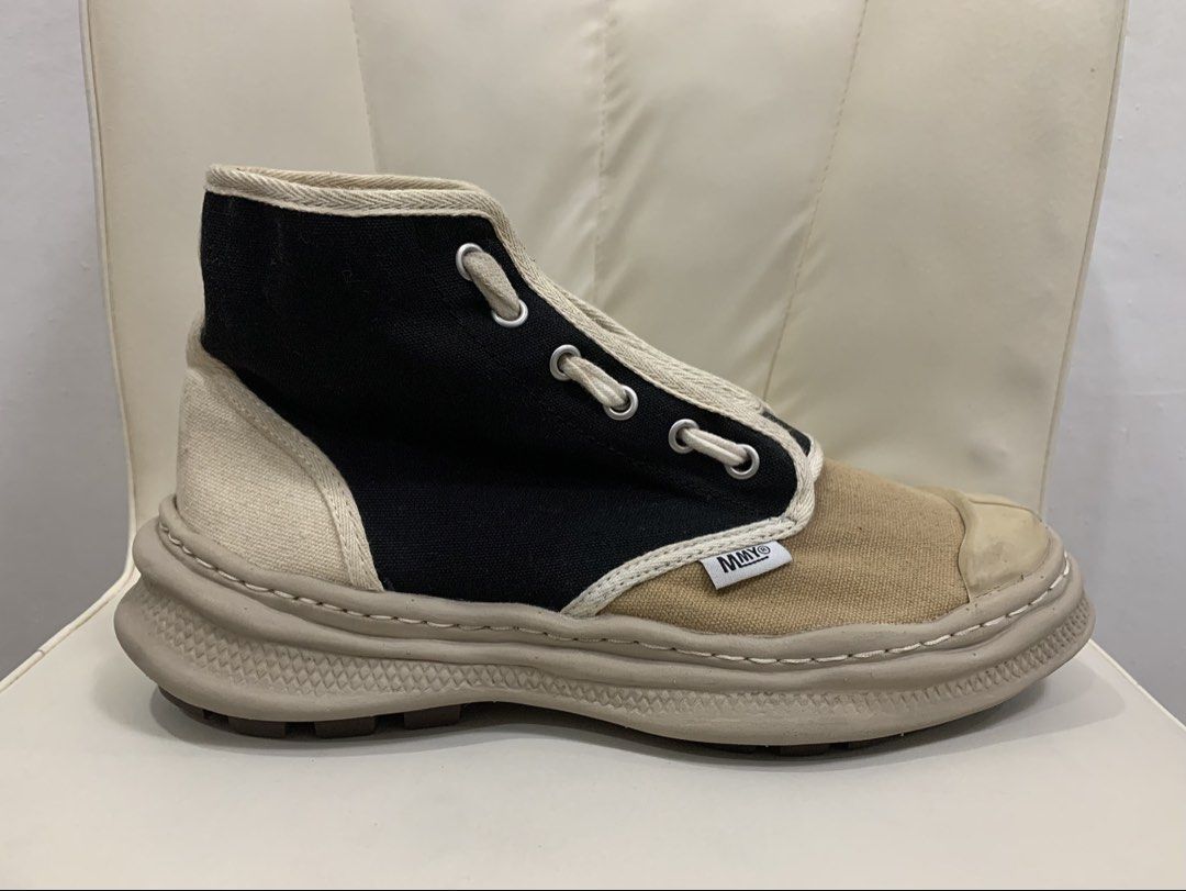MMY ORIGINAL SOLE MILITARY SNEAKER BOOTS (Category: Sneakers) located in Cavite. Submitted by ___layern0ne (Listing ID 1463666299, Image 3). Description: • Marked Size: 42 • No inclusions | Pair only • The pair is still in good, well used vintage condition • The tan canvas panels around the toe box and the off-white rubber toe caps show minor superficial surface scuffing and light discoloration, which aligns naturally with light wear on these spe