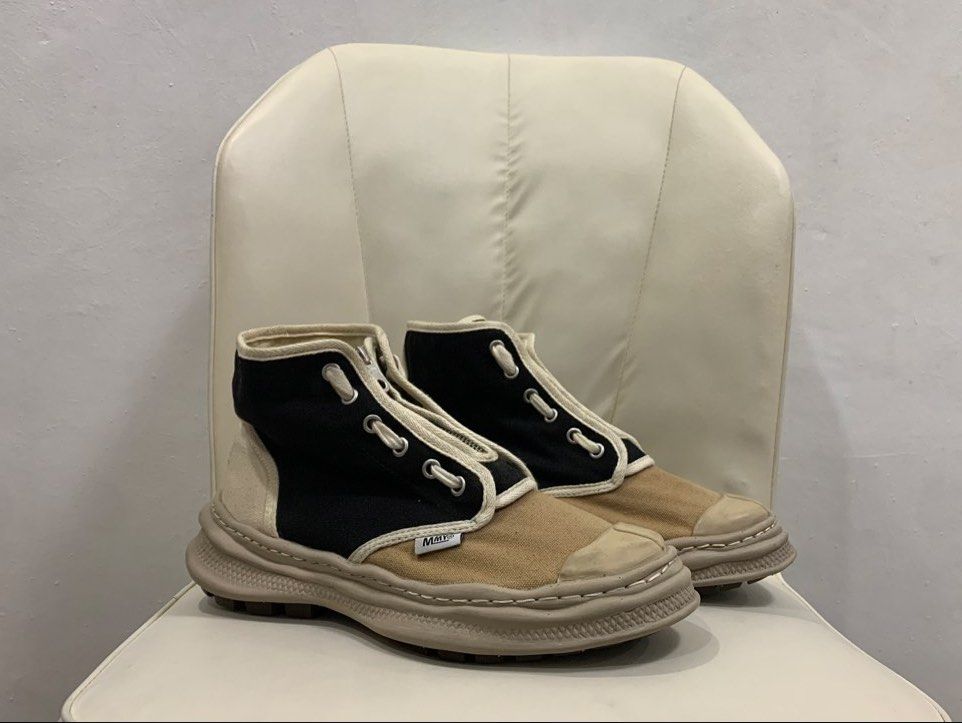 MMY ORIGINAL SOLE MILITARY SNEAKER BOOTS (Category: Sneakers) located in Cavite. Submitted by ___layern0ne (Listing ID 1463666299, Image 1). Description: • Marked Size: 42 • No inclusions | Pair only • The pair is still in good, well used vintage condition • The tan canvas panels around the toe box and the off-white rubber toe caps show minor superficial surface scuffing and light discoloration, which aligns naturally with light wear on these spe