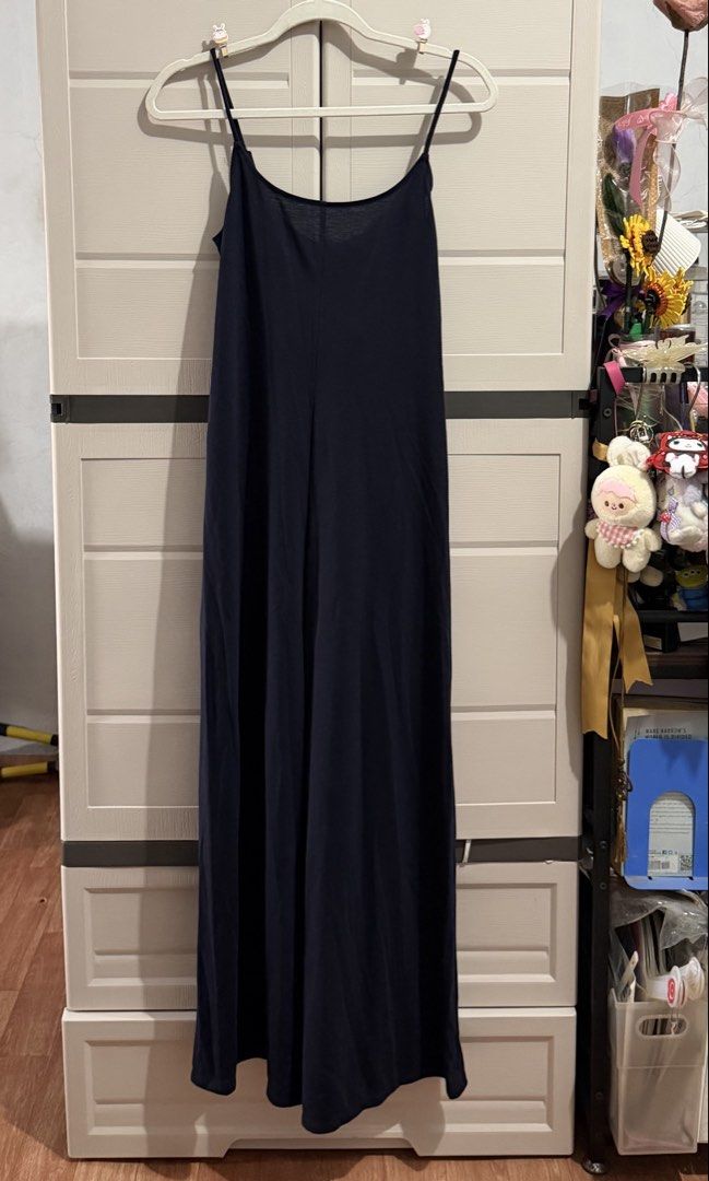 MNG Navy Blue Spaghetti Strap Maxi Jumpsuit (Category: Dresses) located in Imus. Submitted by ann.declutters22 (Listing ID 1463601110, Image 1). Description: - my sister wore it for the pic and her size are: bust 36, waist 31 - Navy blue MNG jumpsuit - Thin spaghetti straps - Simple, versatile silhouette - Great for layering or wearing on its own - Comfortable - Size M .