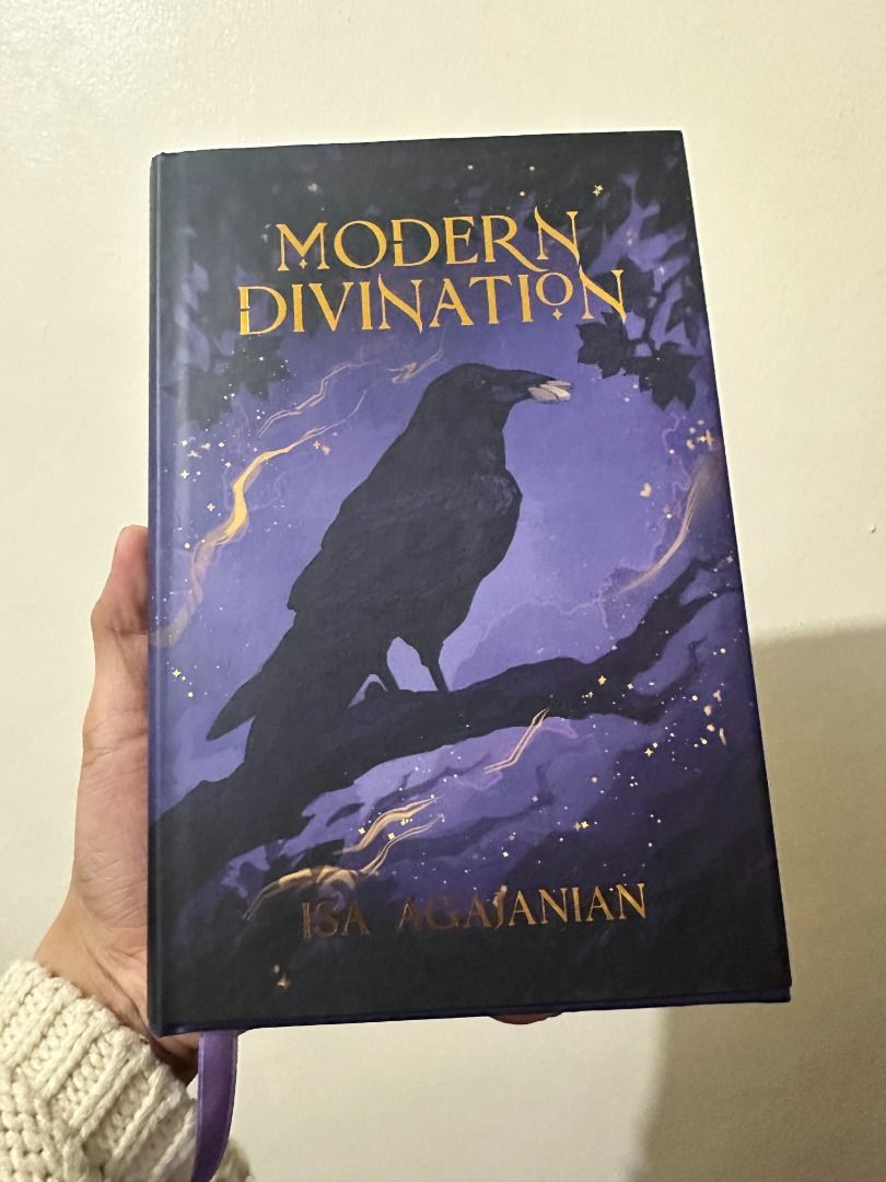 Modern Divination by Isa Agajanian - Owlcrate Edition (Category: Storybooks) located in Pasay City. Submitted by library_hecate (Listing ID 1463649502, Image 1). Description: - Beautiful hardcover book: Modern Divination - Special Owlcrate edition - Mystical cover art: features a raven and a haunted house - Unique spine design: sword and vine motif - Ideal for fans of divination and fantasy books Signed by Isa Agajanian Exclusive redesigned dust 