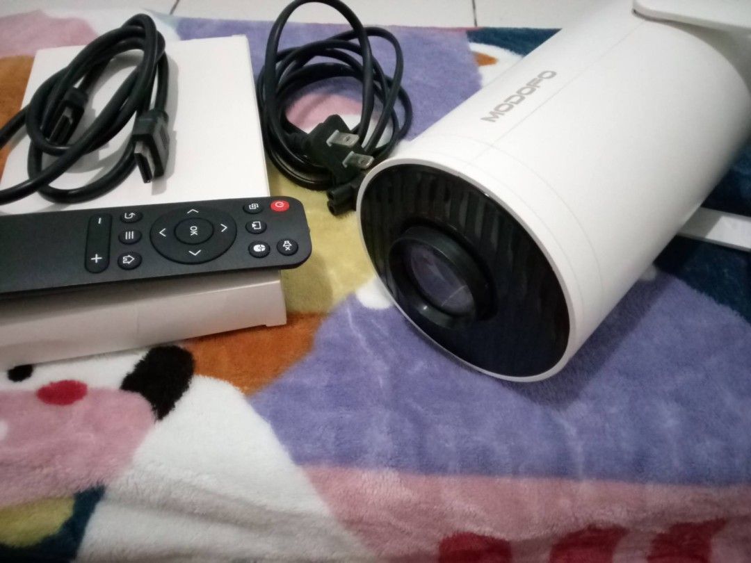 MODOFO 4K MINI PROJECTOR (Category: Projectors) located in Manila. Submitted by joshuam1994 (Listing ID 1463657293, Image 3). Description: ‎🔥 DECLUTTER SALE🔥 ‎Looking for a Projector for your home, office, business, or movie nights? 🎥🍿 ‎ ‎MODOFO 4K MINI PROJECTOR ‎Perfect pang movie night, presentations, gaming, at bonding with family! ❤️ ‎Hindi masyado nagamit,naka tabi nalang. ‎ ‎selling for only 1500 still nego!! ‎ ‎.