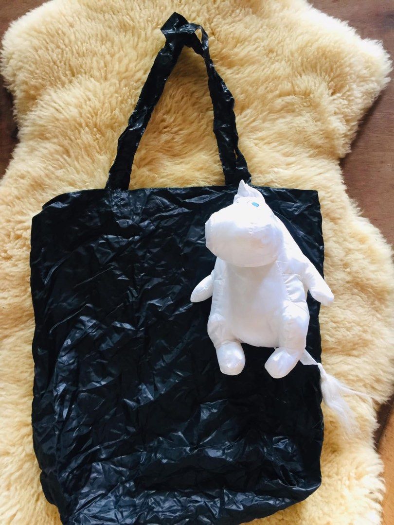 MOOMIN foldable mascot eco bag (Category: Tote Bags) located in Baguio. Submitted by izza_thrifty (Listing ID 1463571567, Image 2). Description: - Adorable Moomin tote bag - Includes a detachable Moomin face pouch with clip - Tote bag is black and made of crinkled material - Ideal for shopping and everyday use - Pouch features a cute Moomin face design.