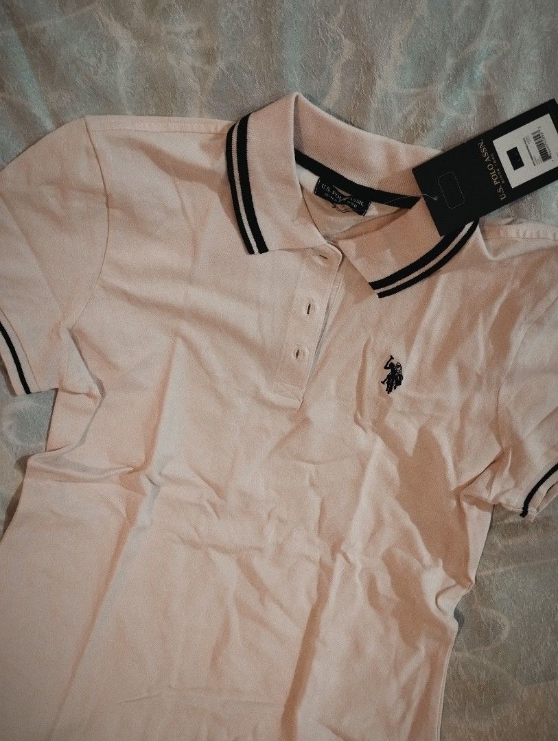 MPO - USPA (Category: Shirts) located in Quezon City. Submitted by omise_supershop (Listing ID 1463655194, Image 1). Description: - Mall pull out only - US Polo Assn. pink polo shirt - Brand new with tags attached.