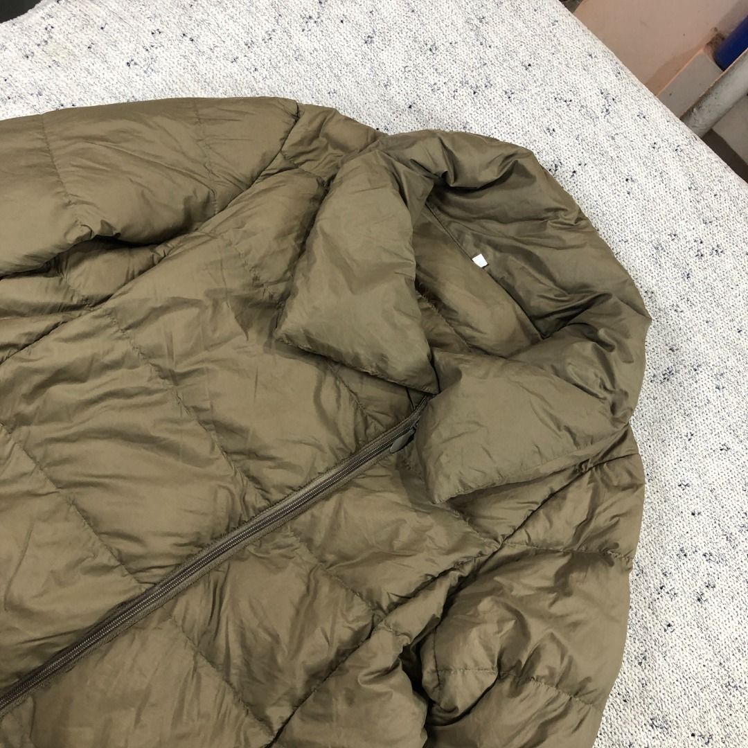 MUJI Beige Nylon Lightweight Down Jacket Size Large (Category: Coats, Jackets and Outerwear) located in Santa Rosa. Submitted by sergids (Listing ID 1463693079, Image 1). Description: MUJI Beige Nylon Lightweight Down Jacket Size Large Great condition. Check fitting tops to ensure this fits you. Dimensions below are exact measurements, see pics as well for comparison. 9/10 Condition and Colorway Dimensions: Check pic slide for actual size and dim