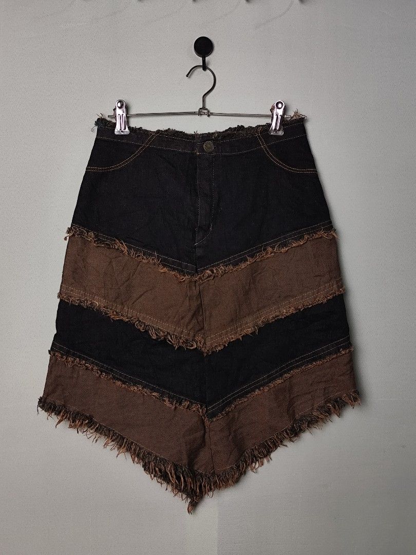 Multi-tiered denim mini skirt featuring a V-shaped (Category: Skirts) located in Aroroy. Submitted by kramjoseph_6 (Listing ID 1463647076, Image 1). Description: Lenght:21 Waist:26 excellent condition no flaws.
