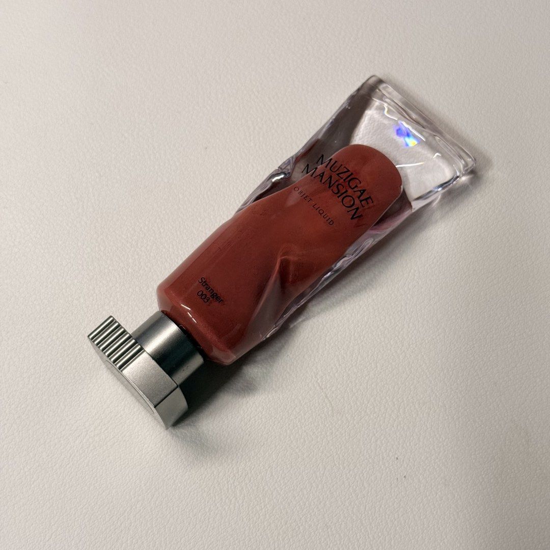 Muzigae Mansion Objet Liquid 003 Stranger Lip Tint (Category: Makeup) located in Muntinlupa City. Submitted by lovedbyapril (Listing ID 1463688311, Image 1). Description: - Muzigae Mansion Objet Liquid in shade 003 Stranger - No box, used only once but tone doesnt match my skin tone - Expiration Date: 2028.03.10.