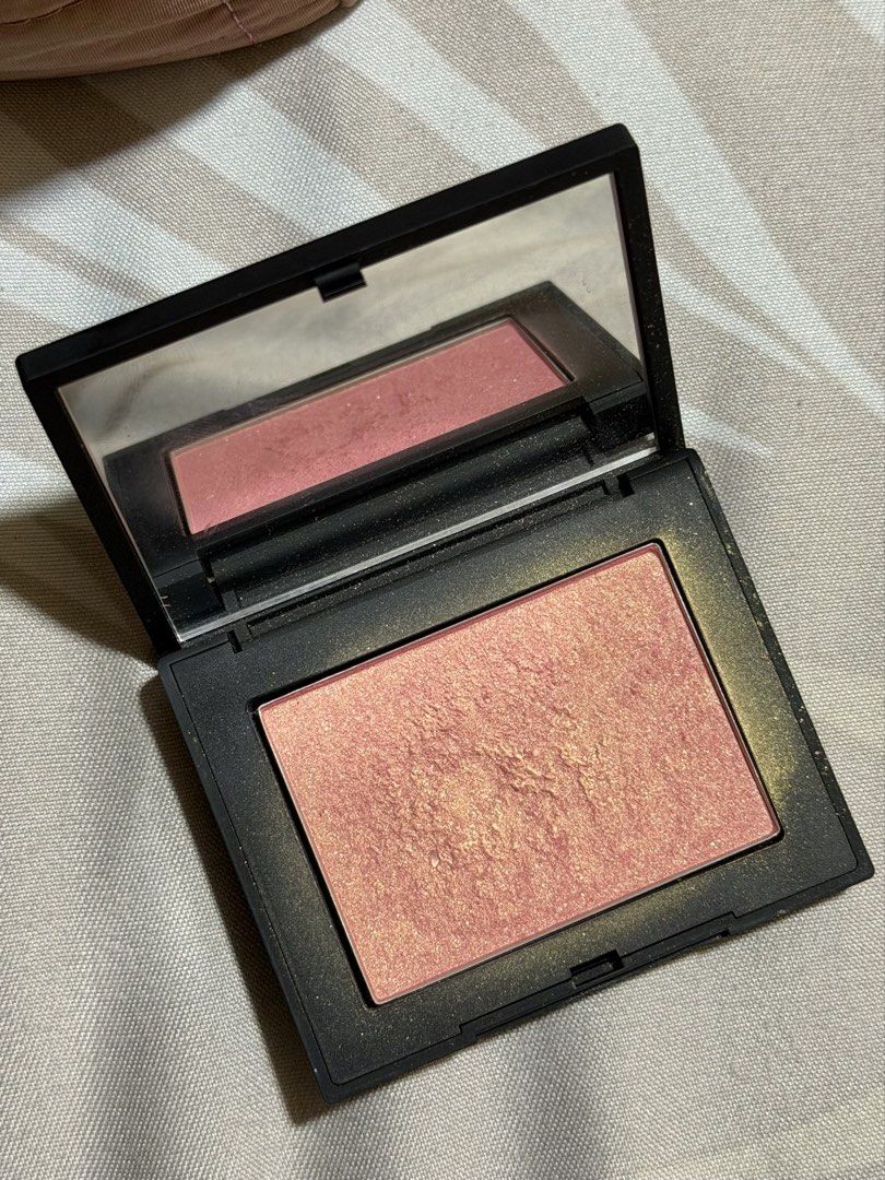 NARS Blush - Orgasm (Category: Makeup) located in Quezon City. Submitted by h.h.prelovedandbrandnew (Listing ID 1463689587, Image 1). Description: - Full size - Shade: Orgasm - Color: Peachy pink with golden shimmer - Finish: Gives a nice glow to the cheeks - Condition: Some product has been used, plenty of product left.