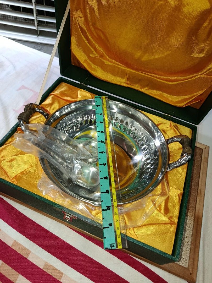 Native Dimpled Stainless pot with cover and 2 small laddle (Category: Cookware & Accessories) located in Quezon City. Submitted by kristal68 (Listing ID 1463650651, Image 1). Description: with box.