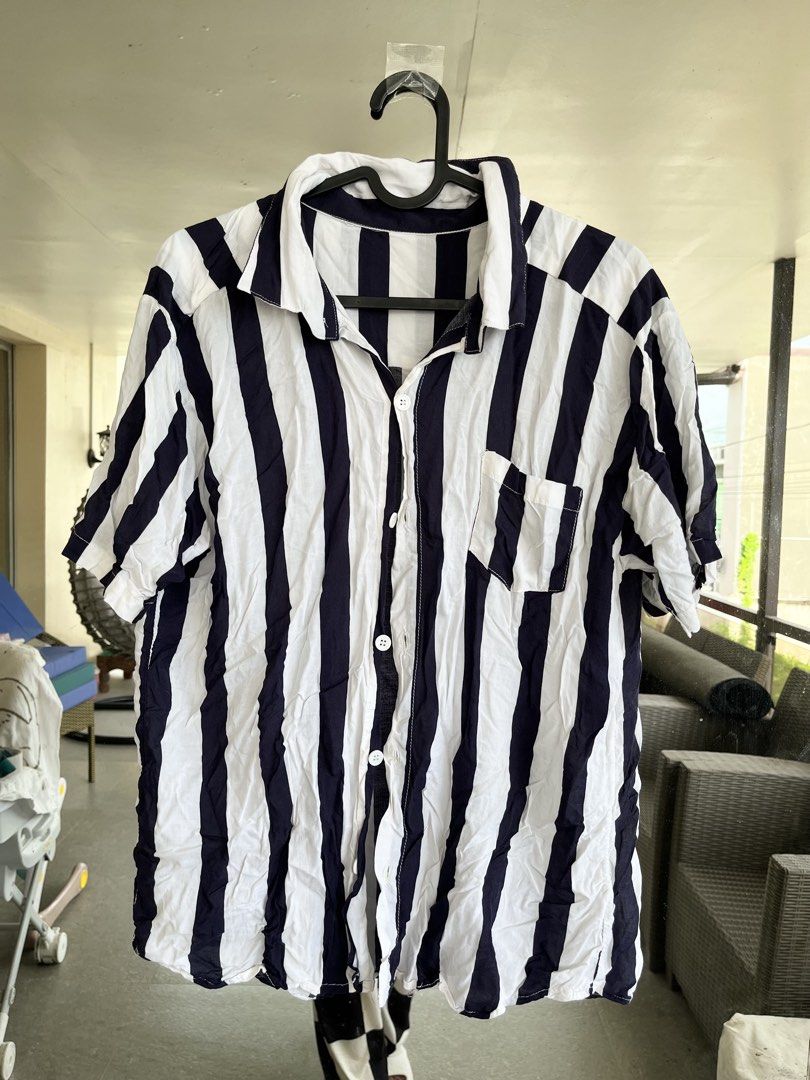 Navy & White Striped Button-Down Shirt | Lightweight Beach Cover-Up (Category: Coats, Jackets and Outerwear) located in Bulacan. Submitted by rks_closet (Listing ID 1463583417, Image 2). Description: Description 🌊 NAVY & WHITE STRIPED BEACH COVER-UP 🌊 Chic and lightweight navy & white vertical striped button-down shirt — perfect as a beach/pool cover-up or casual oversized outer layer. 🤍💙 ♡ Navy & white vertical stripes ♡ Lightweight, breezy 
