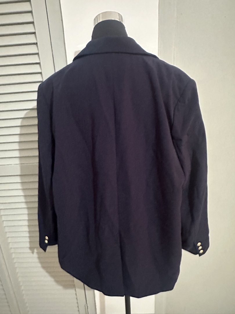 Navy Blue Blazer Jacket (Category: Coats, Jackets and Outerwear) located in Subic. Submitted by ruffa_assorted_item (Listing ID 1463633264, Image 2). Description: - Classic navy blue blazer - Two front pockets - Button detail on cuffs - Versatile for dressing up or down - Easy to style for work or casual outings.