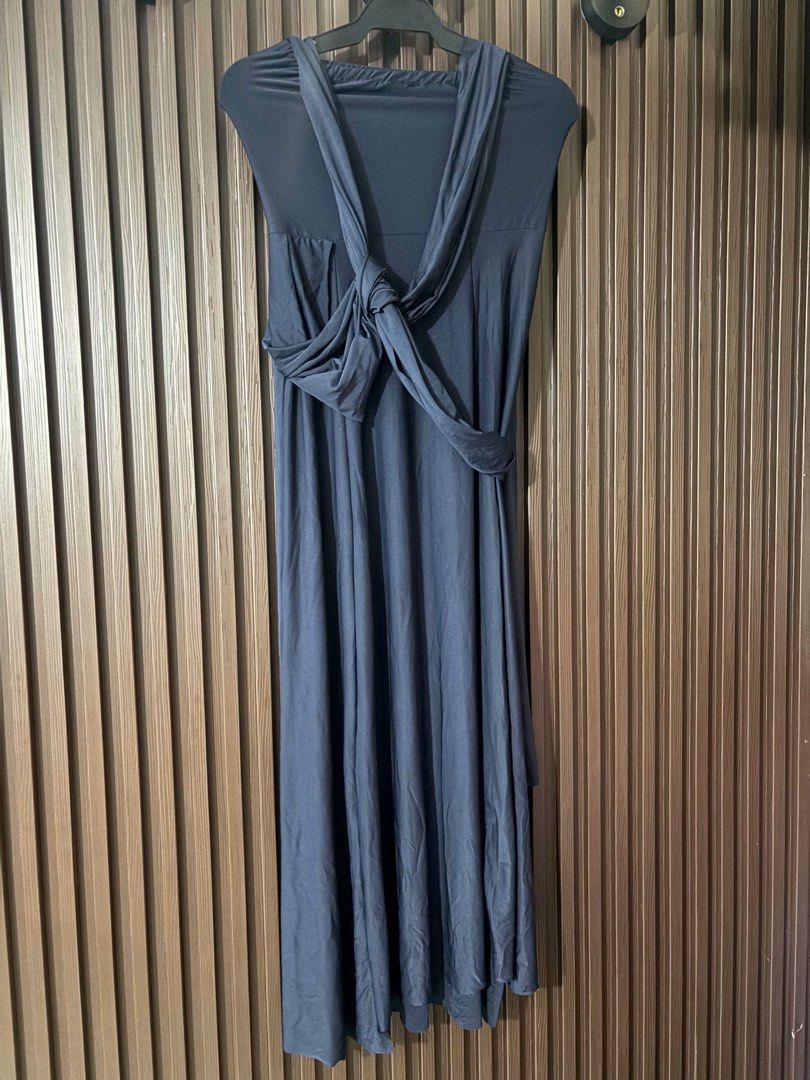 Navy Blue Convertible Infinity Dress S-M (Category: Dresses) located in Guiguinto. Submitted by potypeasy (Listing ID 1463579734, Image 2). Description: - Versatile navy blue infinity dress - Can be styled in countless ways - Stretchy and comfortable fabric - Ideal for formal events or casual outings - Fits most sizes - Styling examples available in photos.