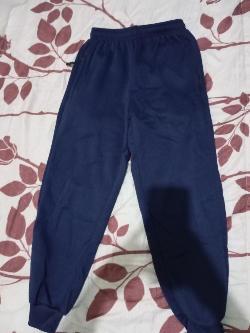 Navy Blue Jogger Pants (Category: Other Bottoms) located in Dasmarinas. Submitted by kei05 (Listing ID 1463570215, Image 1). Description: - Navy blue jogger pants - Elastic waistband with drawstring - Cuffed ankles - Two side pockets - Comfortable for lounging or workouts - Great for everyday wear Garterized Length 34 inches.