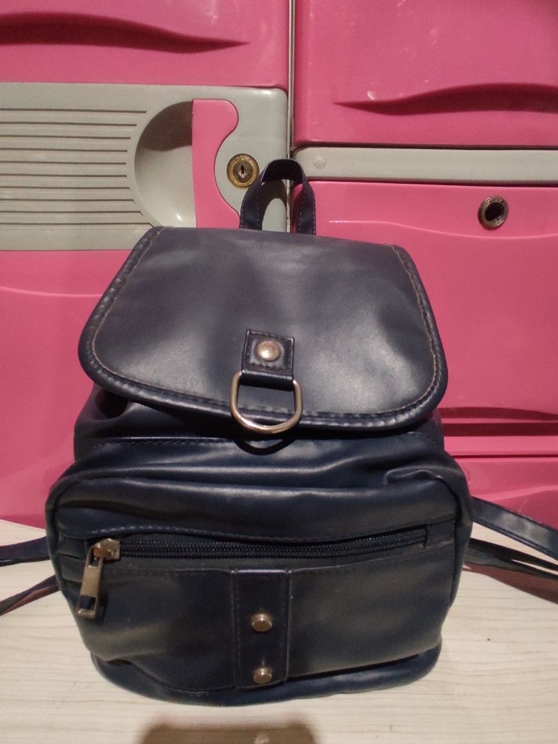 Navy Blue Parisian Faux Leather Mini Backpack (Category: Backpacks) located in Manila. Submitted by xiaochao.16 (Listing ID 1463739100, Image 3). Description: - Cute navy blue mini backpack - Faux leather material - Front zip pocket - Main compartment - Adjustable straps - Brand: Parisian - Ideal for everyday use or travel.