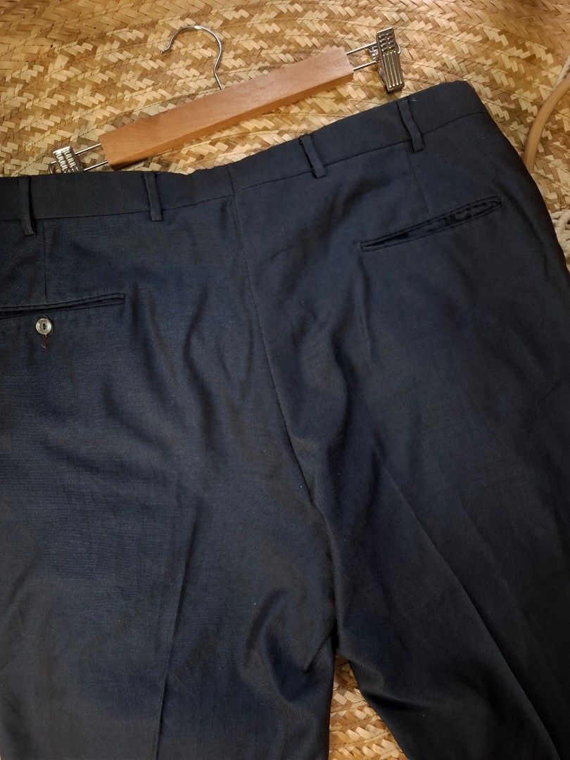 Navy Blue Trousers - 38 Waistline (Category: Trousers) located in Bulacan. Submitted by cathycampo51092 (Listing ID 1463677222, Image 2). Description: - Classic navy blue trousers - Size: Waist 38, Length 35, Width 10 - Made from durable fabric - Versatile for formal or casual wear - Care instructions: Dry clean only.