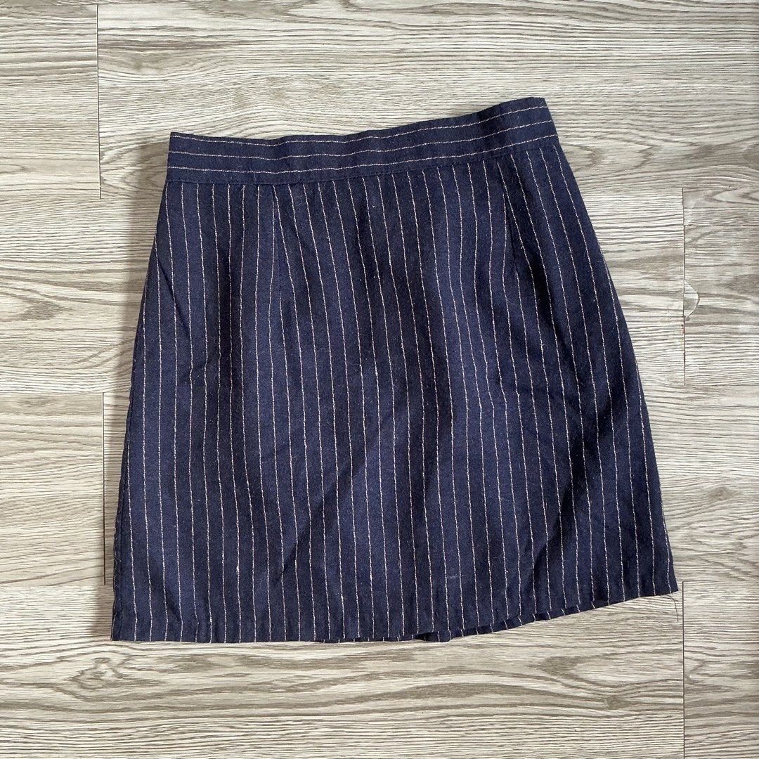 Navy Pinstripe Skirt (Category: Skirts) located in Muntinlupa City. Submitted by lovedbysabel (Listing ID 1463643333, Image 1). Description: Comfortable elastic waistband at the back. Convenient side zipper closure. Versatile for casual outings or office wear Bought during my SoKor Trip.