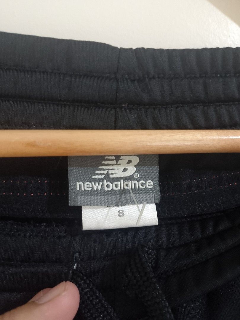 New Balance Black Track Pants (Category: Joggers) located in La Trinidad. Submitted by honeysplushies2 (Listing ID 1463663739, Image 2). Description: - Black New Balance track pants - Drawstring waist for adjustable fit - New Balance logo embroidered on the left leg - Size: 30-32 waist - Length: 39 inches - Comfortable and stylish for everyday wear.