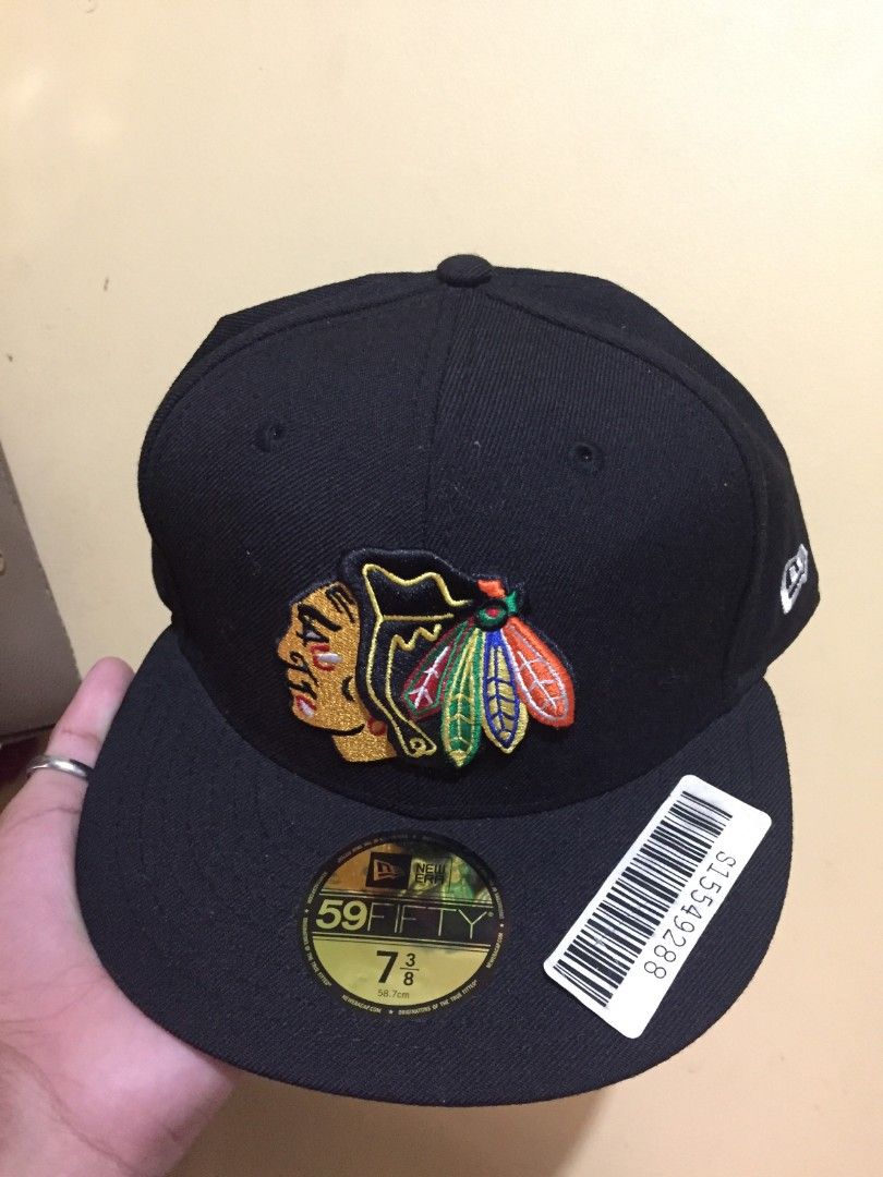 New Era 59FIFTY Chicago Blackhawks Fitted Hat (Category: Caps & Hats) located in Manila. Submitted by mr_kim01 (Listing ID 1463608229, Image 1). Description: - Brand: New Era - Style: 59FIFTY Fitted Hat - Color: Black - Team Logo: Chicago Blackhawks - Size: 7⅜ - Condition: Brand new with original tags attached.