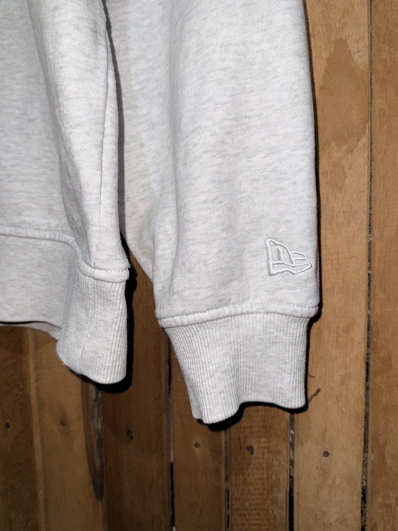 New Era Grey Crewneck Sweatshirt (Category: Coats, Jackets and Outerwear) located in Maramag. Submitted by ghab82885 (Listing ID 1463590207, Image 2). Description: New Era Crewneck Sweatshirt Excellent condition Embroidered logo Size Medium on tag W23” x L27” 380 Only.