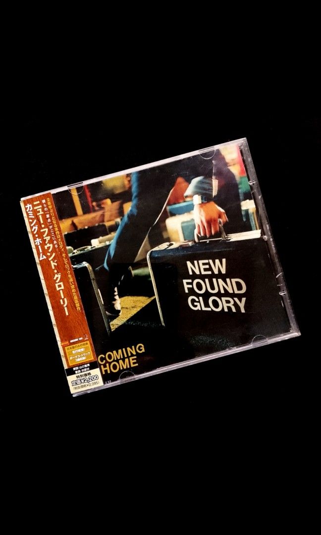 New Found Glory - Coming Home (2006) Japan Press (Category: CDs & DVDs) located in Manila. Submitted by musicsectionph (Listing ID 1463622502, Image 1). Description: FOR SALE: New Found Glory's beautifully matured 2006 alternative rock and pop-punk masterpiece "Coming Home" flagship release!‎‎ ABOUT THIS ALBUM: This is the legendary American rock band's massive fifth studio triumph, co-produced by Thom Panunzio. It features a brilliant shift into