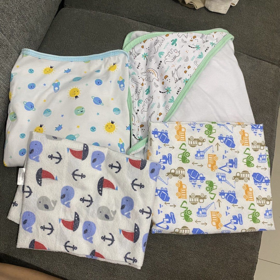 NEWBORN BABY BOY BUNDLE (Category: Babies & Kids Fashion) located in Binan City. Submitted by lagunaxpreloved (Listing ID 1463718193, Image 2). Description: Take all 1300 Swaddle, receiving blanket, nursing cover, baby pillows, baby pillow, lampin.