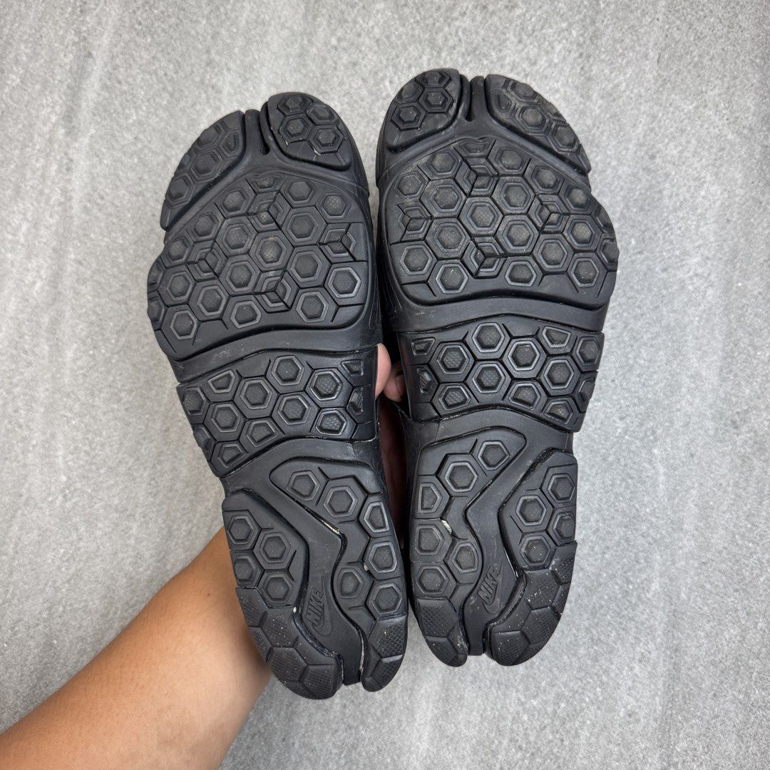 Nike Air Rift Split Toe Sandals Black M9 W10 (Category: Slippers & Slides) located in Manolo Fortich. Submitted by thrift_by_biji (Listing ID 1463687687, Image 3). Description: - Nike Air Rift sandals in black - Unique split-toe design - Hexagonal pattern sole for excellent grip - Size: Men's 9 / Women's 10 - Made in China.