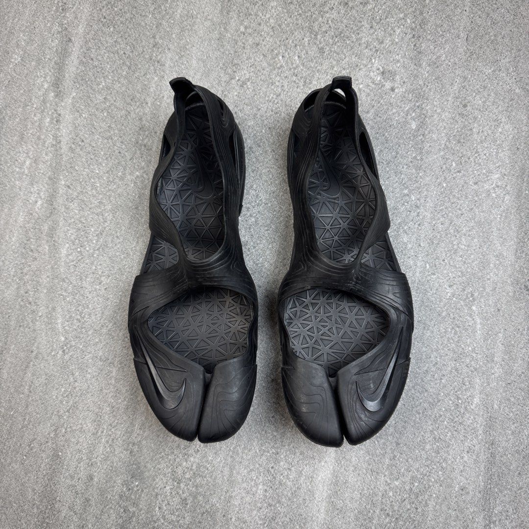 Nike Air Rift Split Toe Sandals Black M9 W10 (Category: Slippers & Slides) located in Manolo Fortich. Submitted by thrift_by_biji (Listing ID 1463687687, Image 1). Description: - Nike Air Rift sandals in black - Unique split-toe design - Hexagonal pattern sole for excellent grip - Size: Men's 9 / Women's 10 - Made in China.