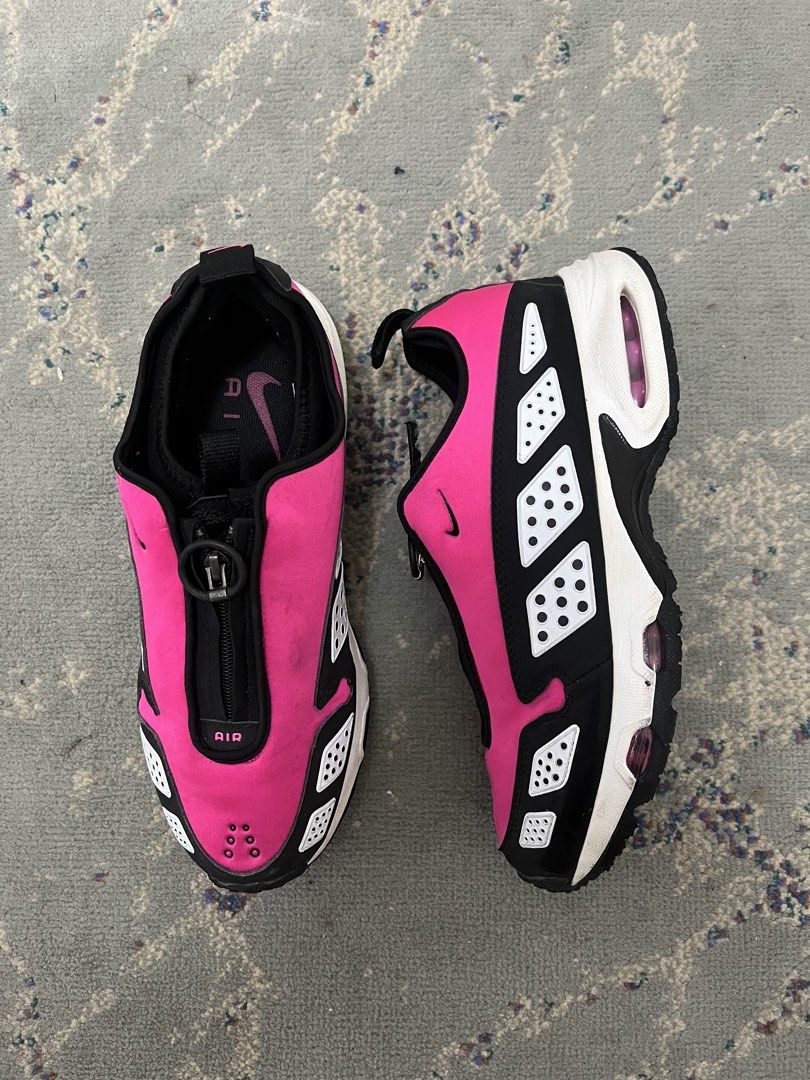 Nike airmax sunders size 9.5 (Category: Sneakers) located in Makati City. Submitted by thankyoupayme (Listing ID 1463641904, Image 1). Description: - Pink and black Nike Air Max Goadome sneakers - Easy zip-up front closure - Comfortable Air Max cushioning in the sole - Distinctive tread pattern for grip - Versatile for everyday wear and athletic activities.