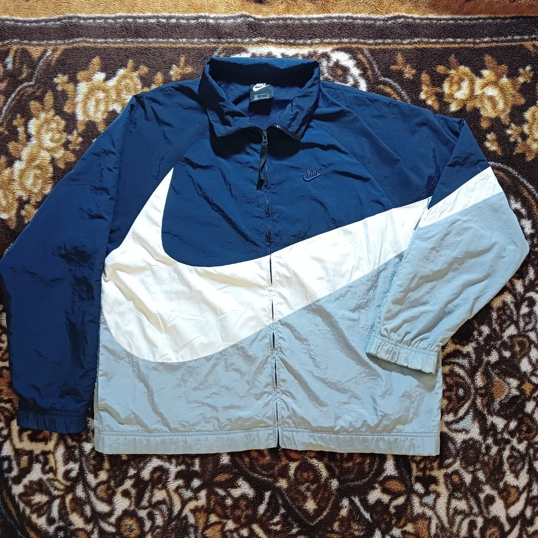Nike Big Swoosh Jacket (Category: Activewear) located in Bugallon. Submitted by gabe-perez (Listing ID 1463672731, Image 1). Description: Nike Big Swoosh Jacket Medium, Width 24.5 x Length 27.