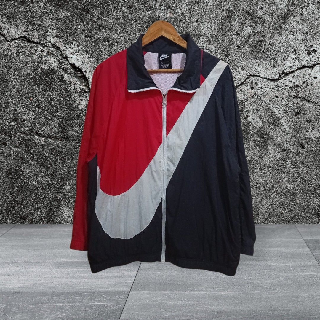 Nike Big Swoosh Track Jacket Red Black White (Category: Coats, Jackets and Outerwear) located in Calatagan. Submitted by lyvertabora (Listing ID 1463610687, Image 1). Description: Dimension:L-28 W-23 colorate:9.6/10 issue:need wash sa white part,see last 3 pictures stain.