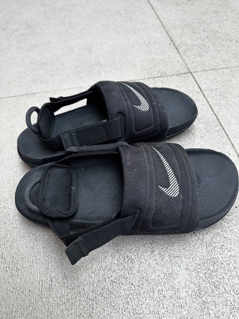 Nike Black Adjustable Strap Sandals (Category: Slippers & Slides) located in Quezon City. Submitted by jareddeuna (Listing ID 1463562760, Image 2). Description: - Black Nike Sandals - Adjustable straps with Nike logo - Made in Vietnam - Size: US 10 / UK 9 / EUR 44 / BR 42 / CN 280(2.5) - Ideal for casual wear.