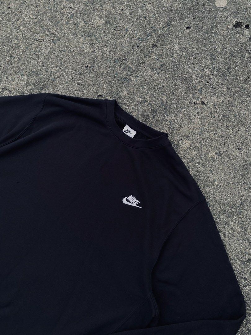 Nike Black Crewneck Sweatshirt (Category: Coats, Jackets and Outerwear) located in San Jose del Monte. Submitted by kidfromnclb (Listing ID 1463726393, Image 2). Description: - Classic black Nike crewneck sweatshirt - Iconic embroidered Nike swoosh logo on chest - Comfortable and versatile for everyday wear - Perfect for layering or wearing solo - Easily pairs with jeans or joggers - Essential wardrobe staple.