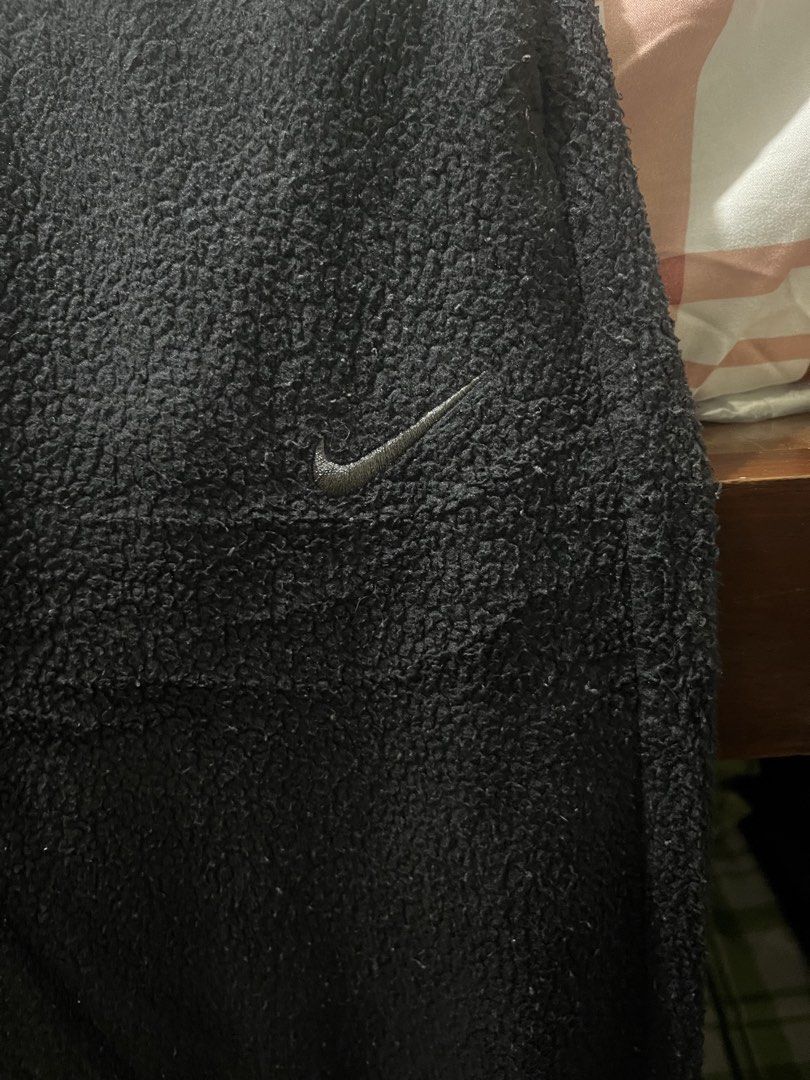 Nike Black Joggers Sweatpants Size XS (Category: Joggers) located in Pasay City. Submitted by Oboyyy (Listing ID 1463644194, Image 2). Description: - Brand: Nike - Type: Fleece Joggers - Color: Black - Material: Super soft and warm fleece - Features: Embroidered Nike swoosh logo on left leg, elastic waistband with drawstring - Fit: Comfortable, adjustable - Best for: Lounging, casual wear - Size: XS.