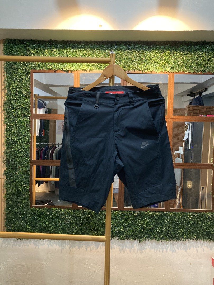 Nike Black Tech Fleece Shorts Men's Size M (Category: Shorts) located in Trece Martires City. Submitted by thriftkoto.91 (Listing ID 1463699596, Image 1). Description: - Black Nike Tech Fleece Shorts - Authentic Nike logo on right leg - Two side pockets and one back pocket - Belt loops for adjustable fit - Versatile for casual wear or sports activities.